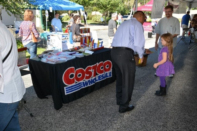Costco Wholesale vendor booth with attendees browsing at CreekFest Houston