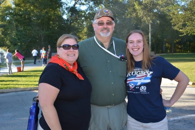 Three attendees posing together at CreekFest Houston