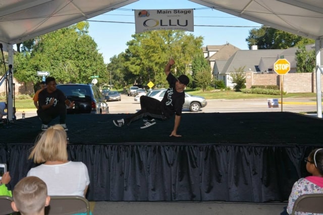 Breakdancer performing on the Main Stage at CreekFest Houston