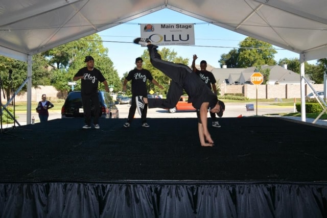 Flez crew breakdancing on the Main Stage at CreekFest Houston