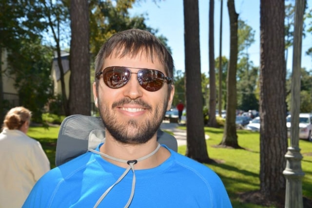 Smiling attendee at CreekFest Houston