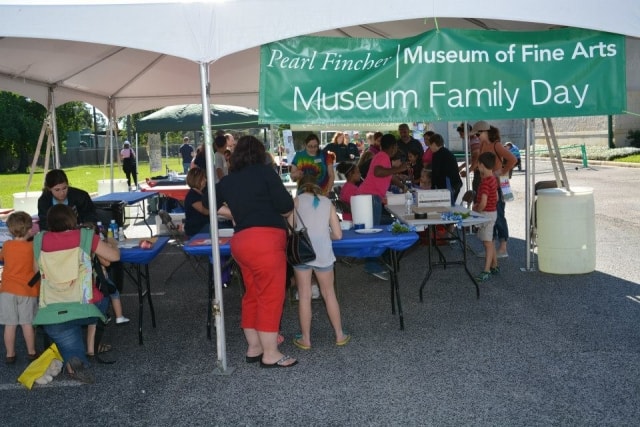 Pearl Fincher Museum of Fine Arts Museum Family Day activity tent at CreekFest Houston