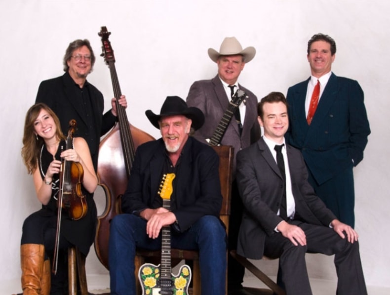 Western country band group portrait with instruments