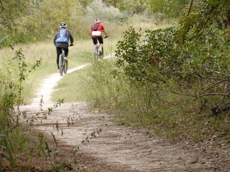 Trail bikers on the Cypress Creek Greenway