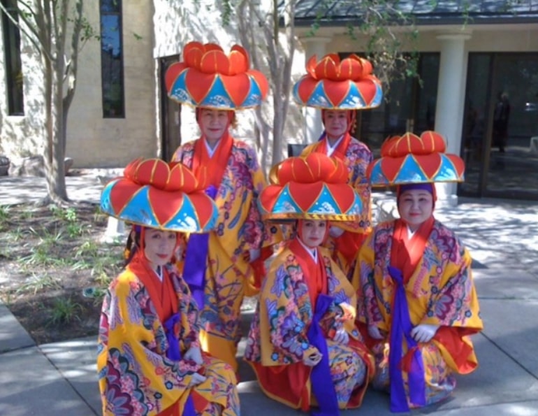 Chinese dancers in traditional costume at a cultural event